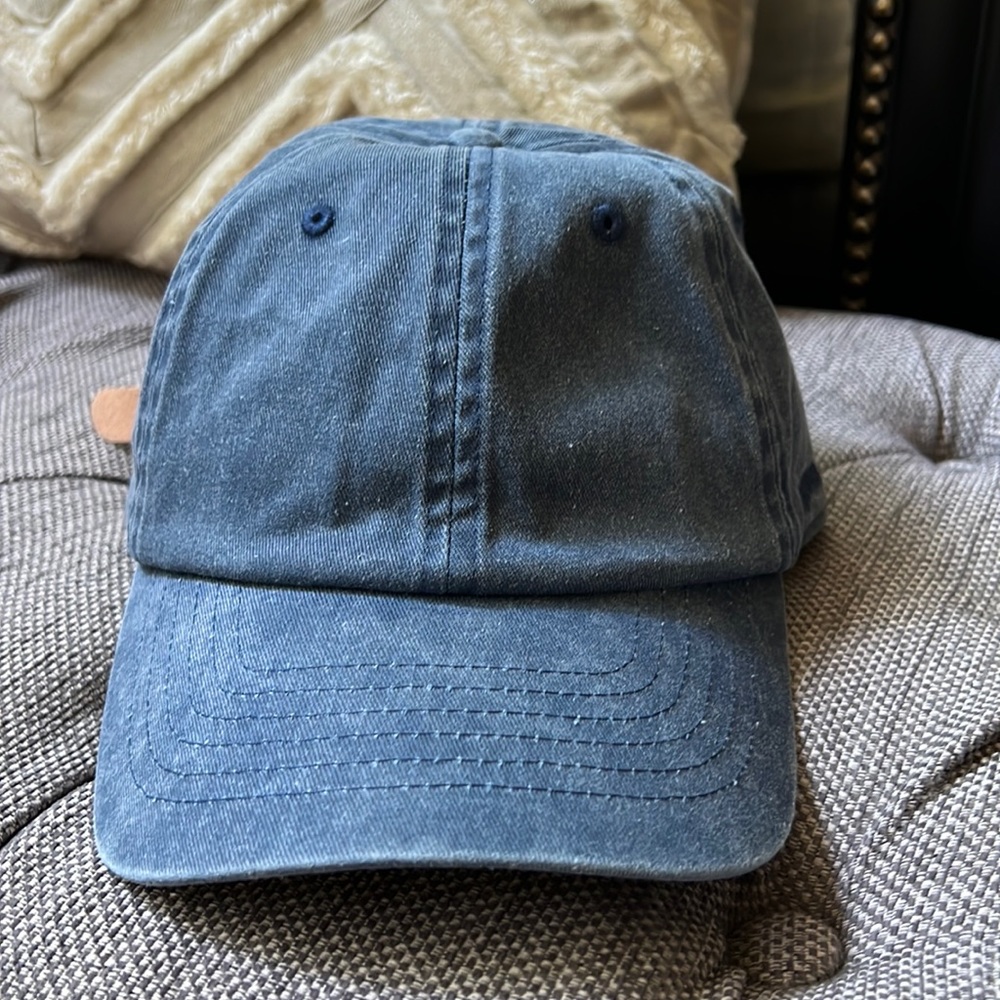 High quality distressed denim hat with leather strap.